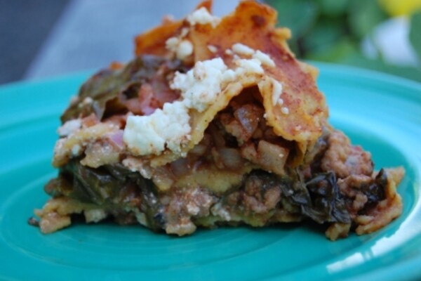 chorizo enchiladas on a turquoise plate