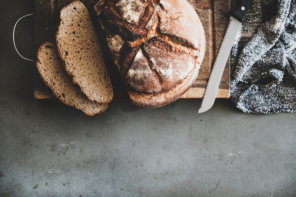 sliced sourdough bread on a cutting board