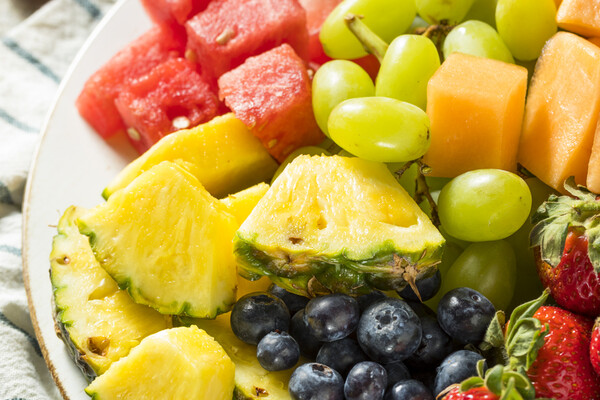 platter of fresh fruit on a white plate
