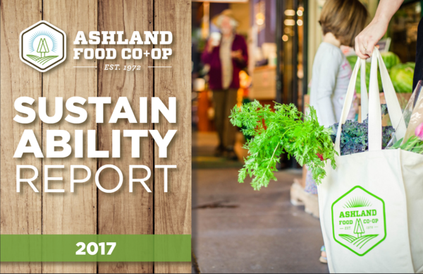 Shopper holding a Ashland Food Co-op Canvas Bas