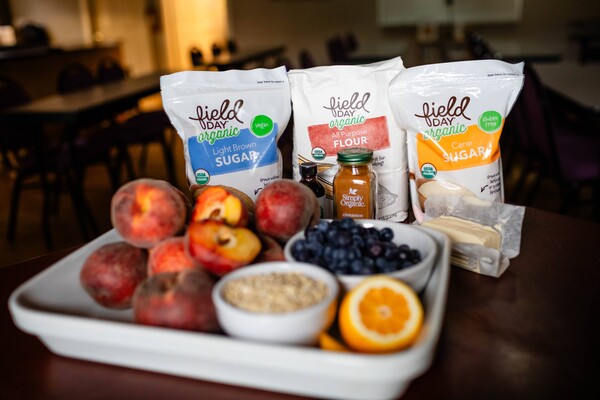 peaches berries sugar flour ingredients for a peach berry crisp recipe