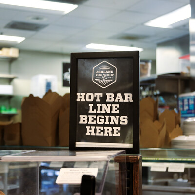 hot bar line begins here sign in black and white