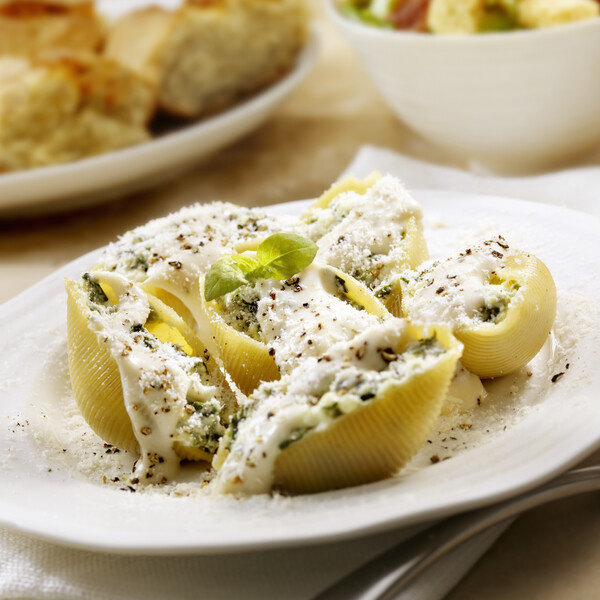 ricotta stuffed shells on a white plate