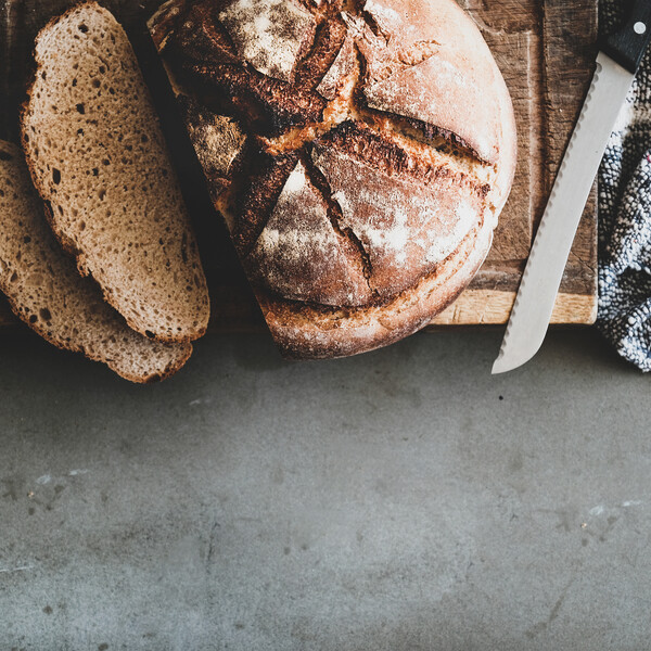sliced sourdough bread on a cutting board