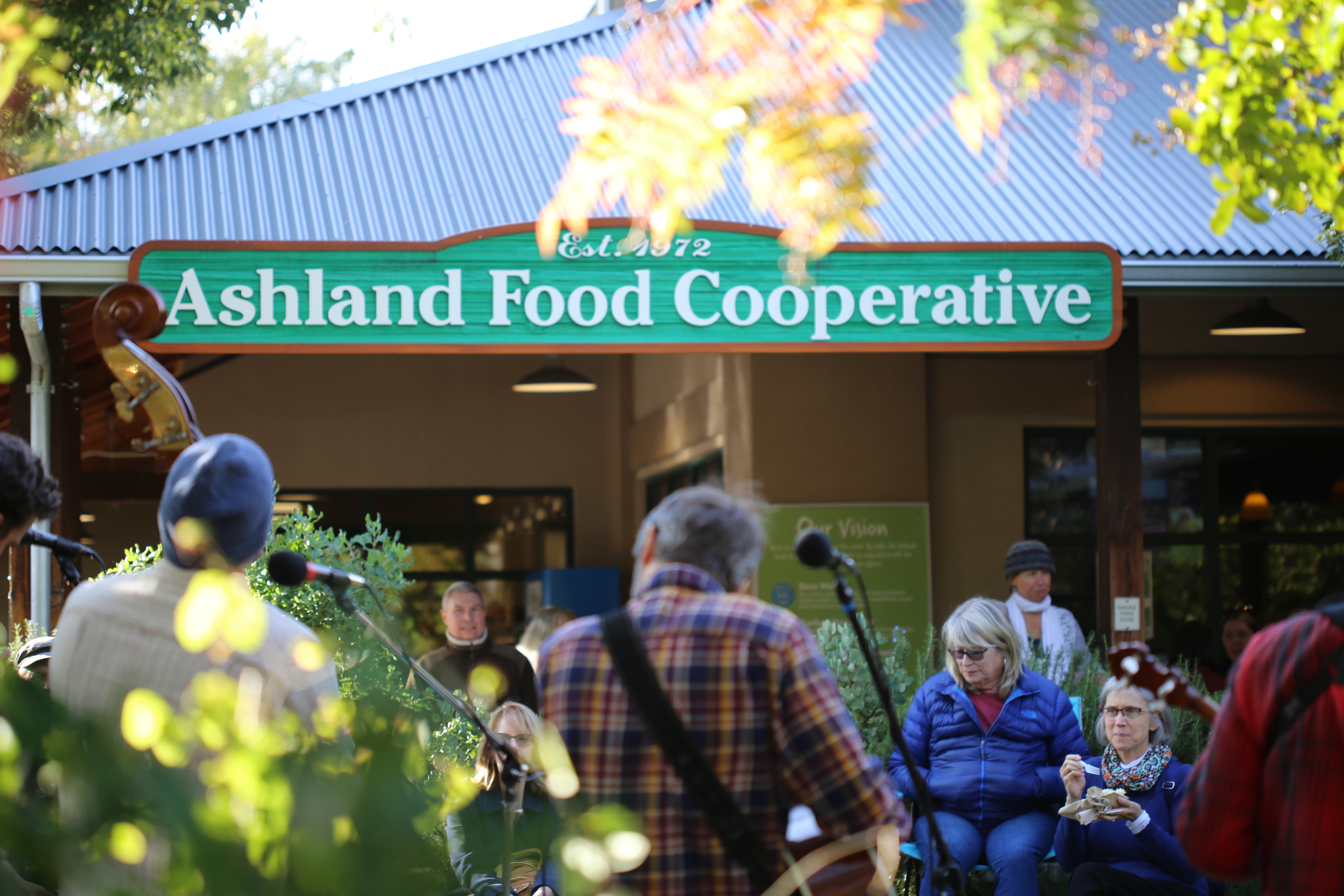 Owners and Shoppers Enjoying Music in front of the Ashland Food Co-op store in 2019
